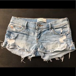 Distressed denim shorts